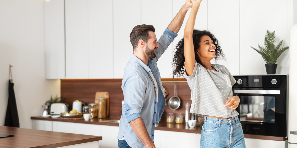 Couple dancing in the kitchen